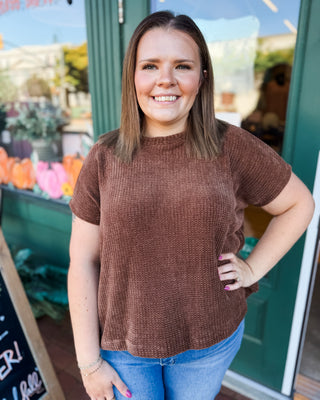 a chenille waffle knit short sleeve flowy top in brown.