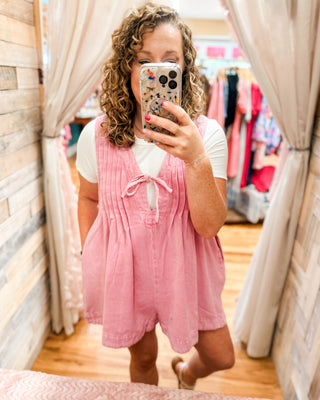 Denim Darling Sleeveless V-Neck Pleated Romper in pink with basic bodysuit underneath
