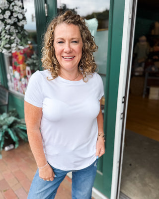 a white round hem basic top