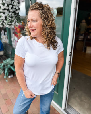 a white rounded hem basic top