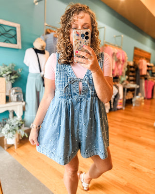 A Pearly Darling Denim V-Neck Pleated Romper - The Southern Loft