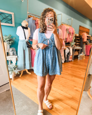 A Pearly Darling Denim V-Neck Pleated Romper - The Southern Loft