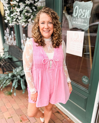 Denim Darling Sleeveless V-Neck Pleated Romper in pink with basic bodysuit underneath