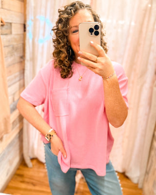 a short sleeve ribbed knit top in candy pink with front pocket