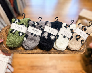 Fuzzy animal print socks in several styles