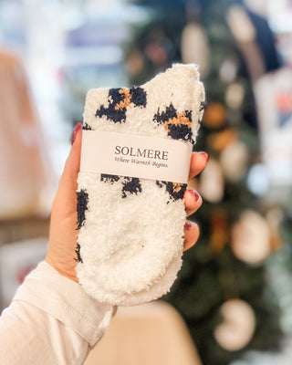 Fuzzy animal print socks in several styles