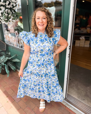 A watercolor tiered midi dress with floral print, double ruffle cap sleeve