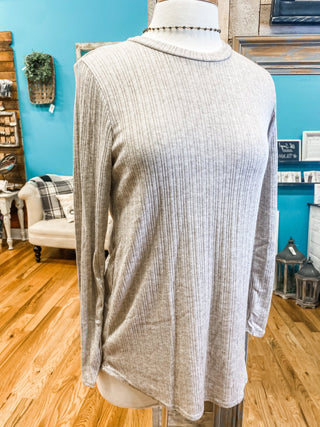 A long sleeve textured style top in an oatmeal gray.