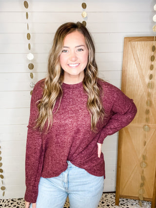 Brushed melange style oversized sweater in a rust color
