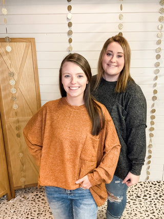 Brushed melange style oversized sweater in a rust color