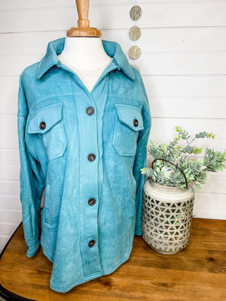 A teal fleece button down shacket