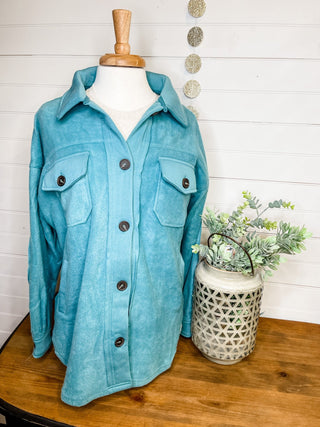 A teal fleece button down shacket