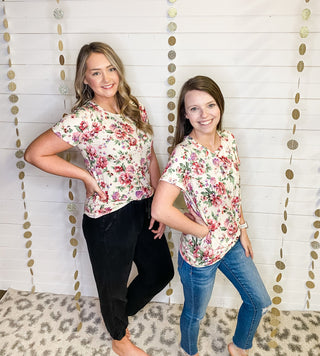 Floral basic style top with a crewneck and buttery soft fabric in cream.