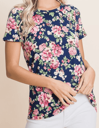 Floral basic style top with a crewneck and buttery soft fabric in navy.
