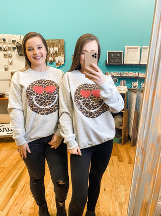 Leopard Happy Face Pullover sweatshirt with heart eyes