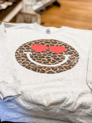 Leopard Happy Face Pullover sweatshirt with heart eyes
