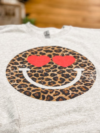 Leopard Happy Face Pullover sweatshirt with heart eyes