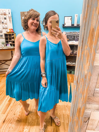 a linen style tiered mini dress in teal