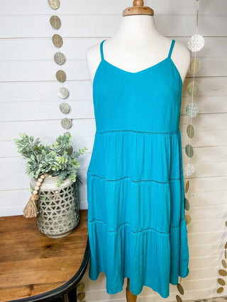 a linen style tiered mini dress in teal