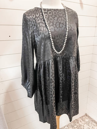 A satin style leopard dress in navy