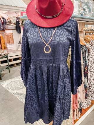 A satin style leopard dress in navy