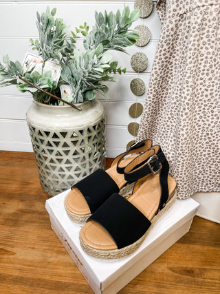 black espadrille style sandals with ankle strap